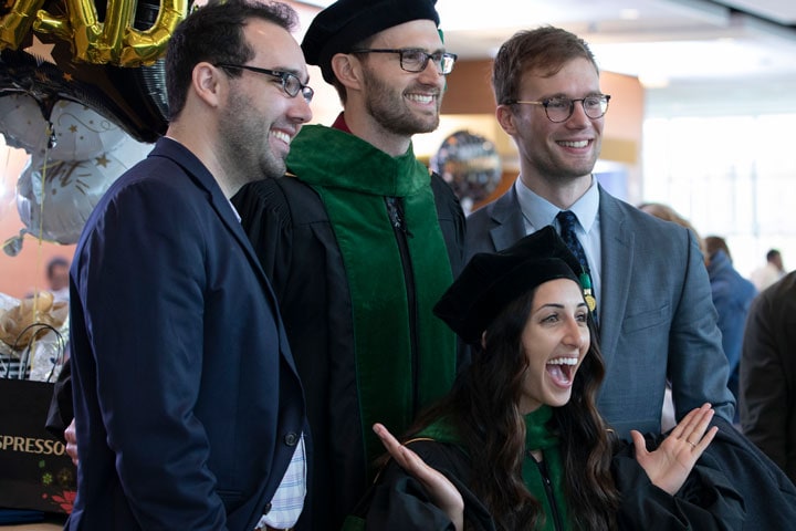 Mayo Clinic graduates celebrating after four long years of medical school.