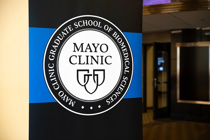 Mayo Clinic Graduate School of Biomedical Sciences sign at the commencement ceremony