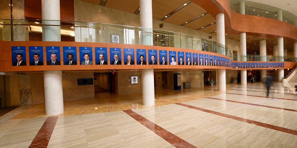 Hallway showing portraits of awardees of the Mayo Clinic GME teachers hall of fame