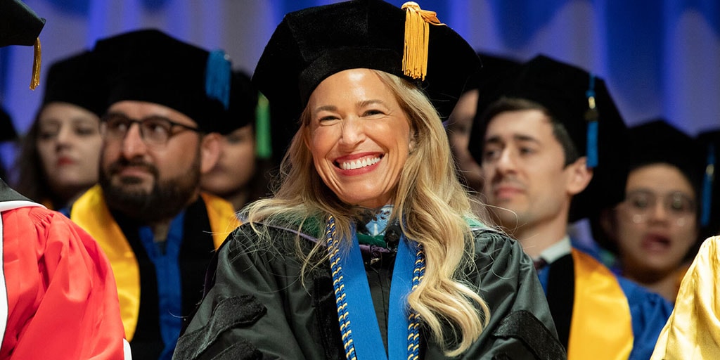 Dawn Mussallem, D.O., the featured speaker for 2023 Commencement, smiles to the crowd
