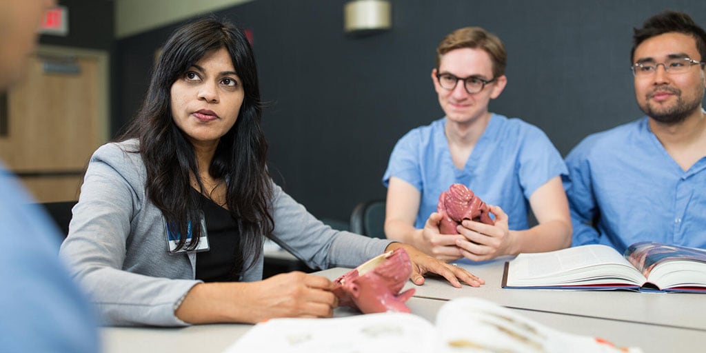 Nirusha Lachman, Ph.D. teaching residents in the Department of Clinical Anatomy
