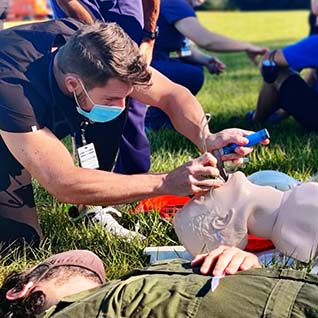 Alix School of Medicine student Donald Pfeifer, III, takes part in a simulated mass casualty exercise