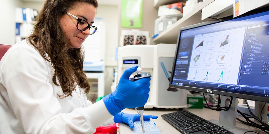 Mayo Clinic graduate student processing a laboratory sample