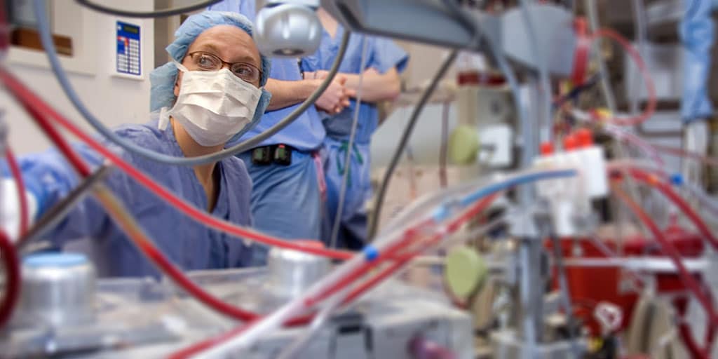 Mayo Clinic cardiovascular perfusionist monitoring a patient in an operating room