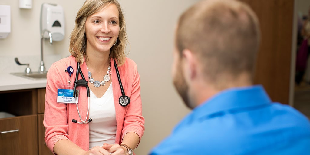 Mayo Clinic physician assistant listening to a patient