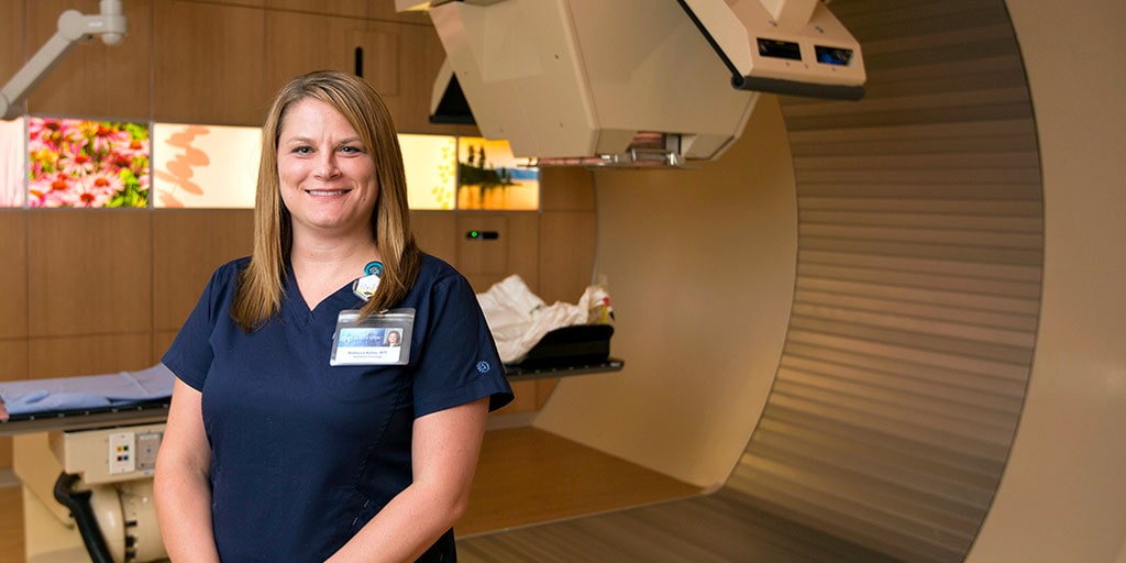 Mayo Clinic radiation therapist standing in procedure room