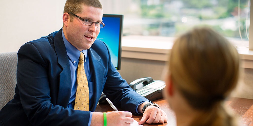 Mayo Clinic medical social worker speaking with a patient