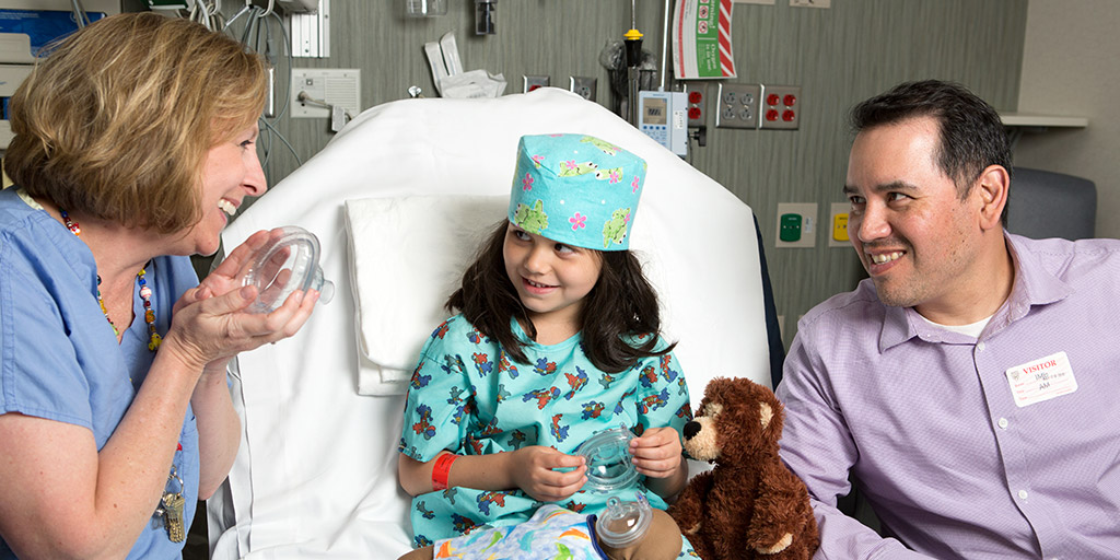 A child life specialist works with a patient at Mayo Clinic in Rochester, Minnesota.