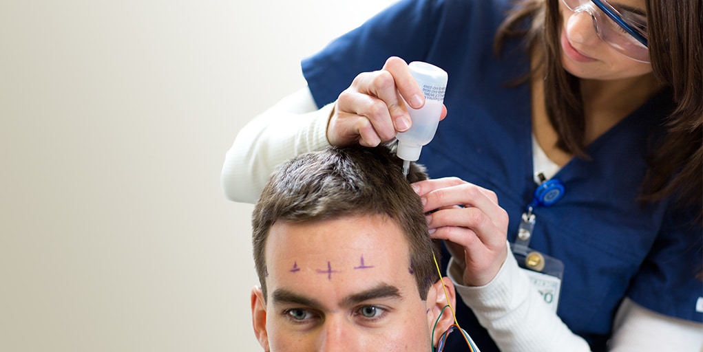 A student working in a sleep study 