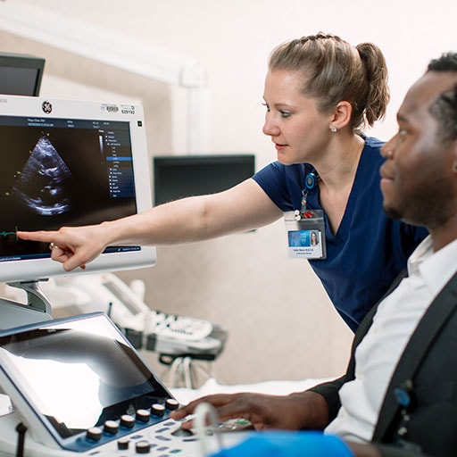 Mayo Clinic echocardiography student and faculty member reviewing an echocardiogram