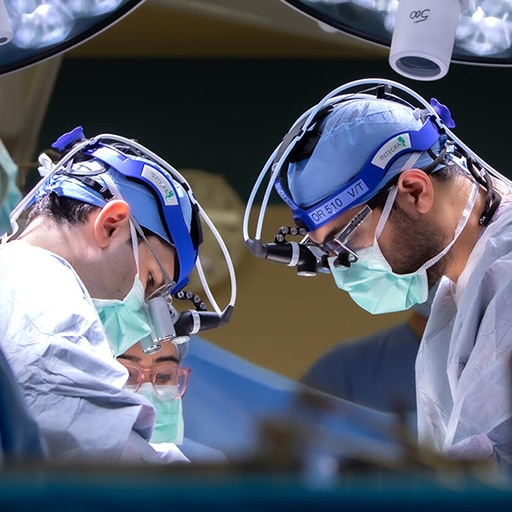 Physicians performing a surgery in the operating room at Mayo Clinic