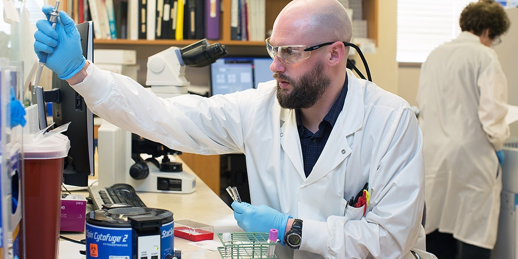 A Mayo Clinic medical laboratory technician performing a test.