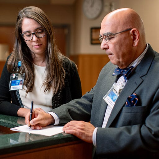 Nurse Practitioner or Physician Assistant Gastroenterology and Hepatology fellow speaks with a faculty member at Mayo Clinic in Rochester, Minnesota.