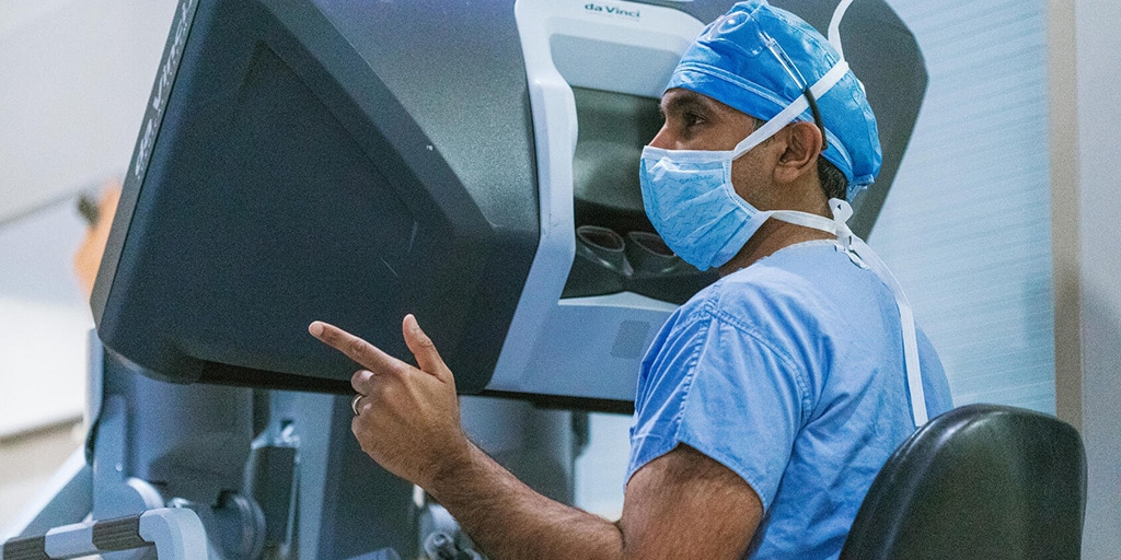 Mayo Clinic physician performing a robotic surgery in the operating room