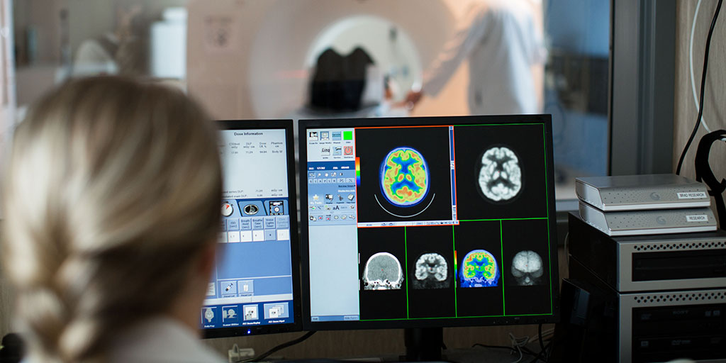 Students performing nuclear medicine scan