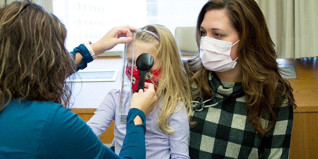 Orthoptic student performing eye exam during Orthoptic Program at Mayo Clinic in Rochester, MN