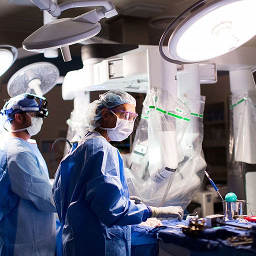 Mayo Clinic heart transplant surgeons in operating room.