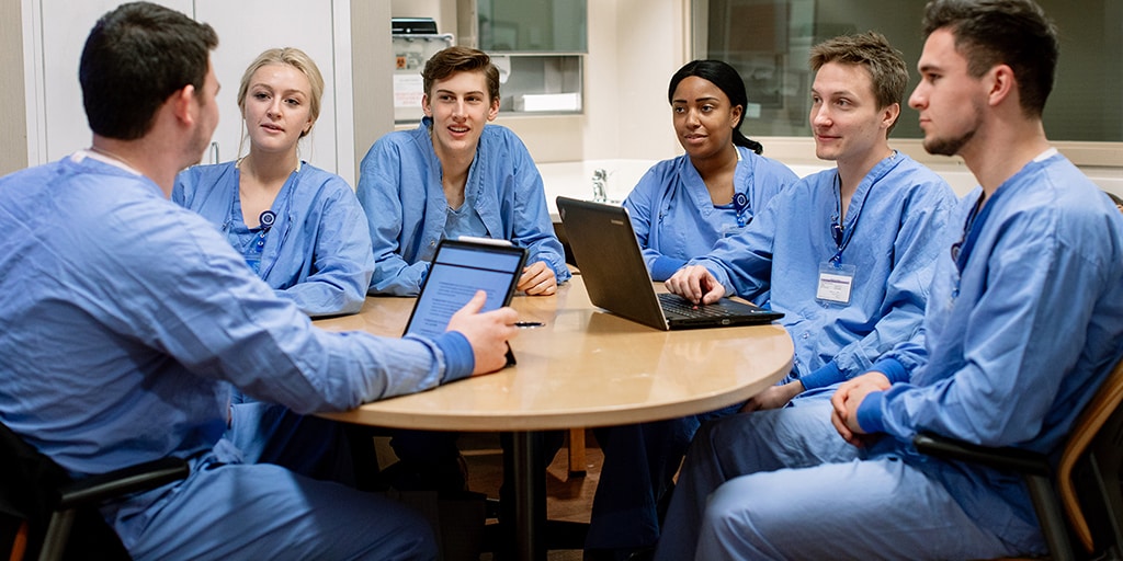 Mayo Clinic surgical first assistants in a meeting