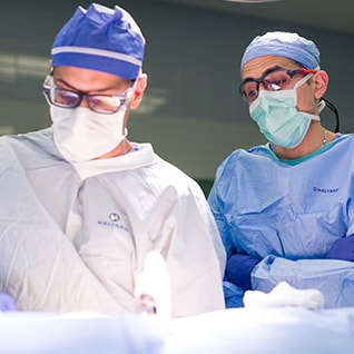 Abdominal transplant surgery faculty and fellow perform an operation at Mayo Clinic