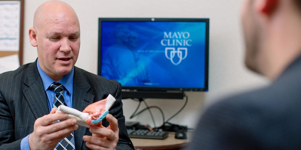 Adult Reconstructive Surgery, Upper Extremity (Shoulder and Elbow) faculty member works with a patient at Mayo Clinic in Rochester, Minnesota.