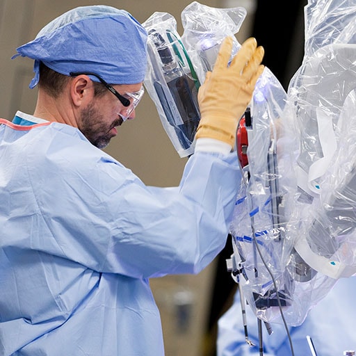 Mayo Clinic physician performing a head and neck transoral surgery