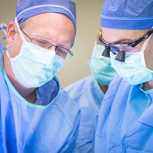 Dr. Kohler and Dr. Ziegelmann working together in the operating room at Mayo Clinic in Rochester, Minnesota.