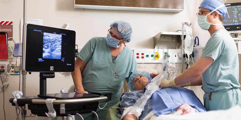 Mayo Clinic anesthesiologists examining a patient