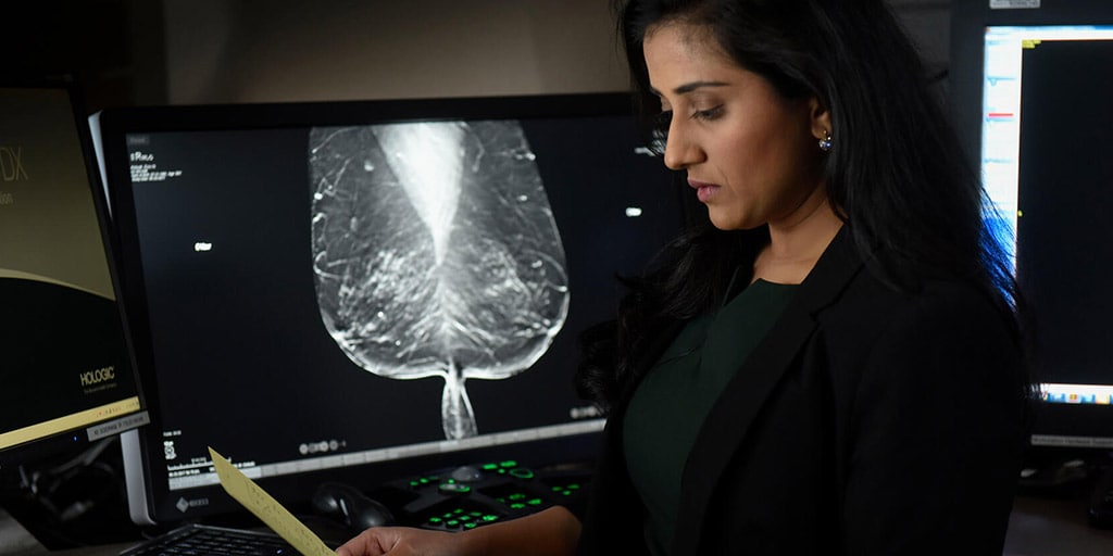 Breast imaging fellow looks at a scan at Mayo Clinic in Jacksonville, Florida.