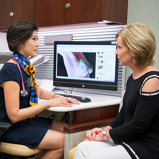 Breast Imaging fellow speaks with a patient at Mayo Clinic in Jacksonville, Florida.