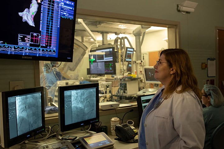 Clinical Cardiac Electrophysiology faculty member supervises in the OR at Mayo Clinic in Jacksonville, Florida.
