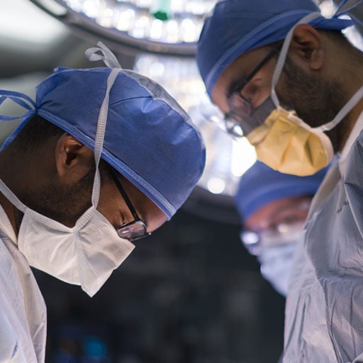 Cardiothoracic Surgery Transplant fellows work together in the operating room at Mayo Clinic in Jacksonville, Florida.