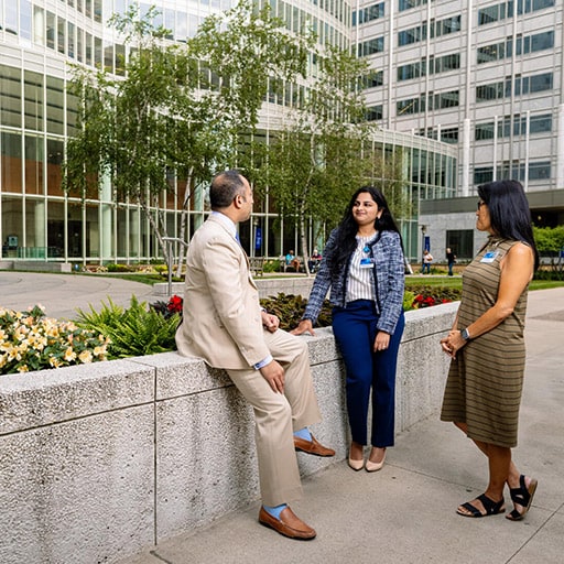 Trainees and faculty from the Department of Laboratory Medicine and Pathology talk outside at Mayo Clinic in Rochester, Minnesota.