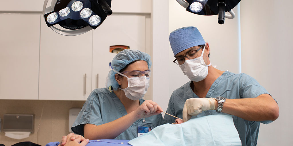 Dermatology trainees in the procedure room