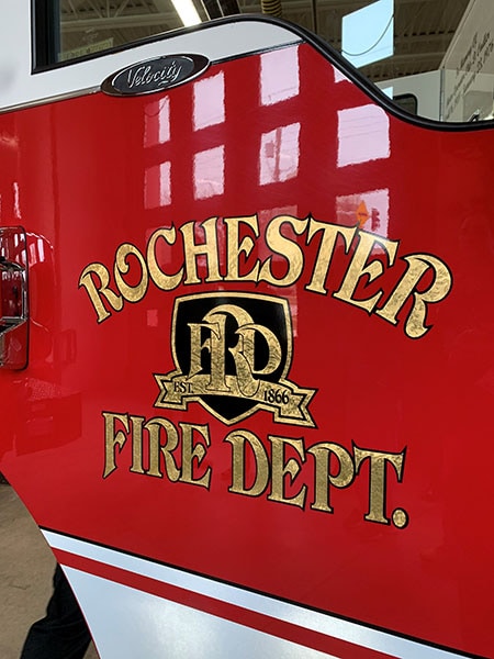 Close-up of a red fire engine door of the Rochester Fire Department