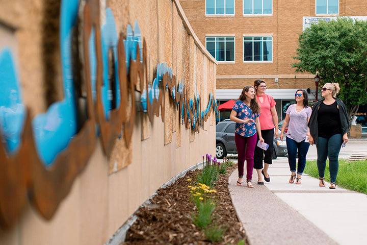 Family medicine residents check out the art sculpture tour in downtown Mankato, Minnesota.