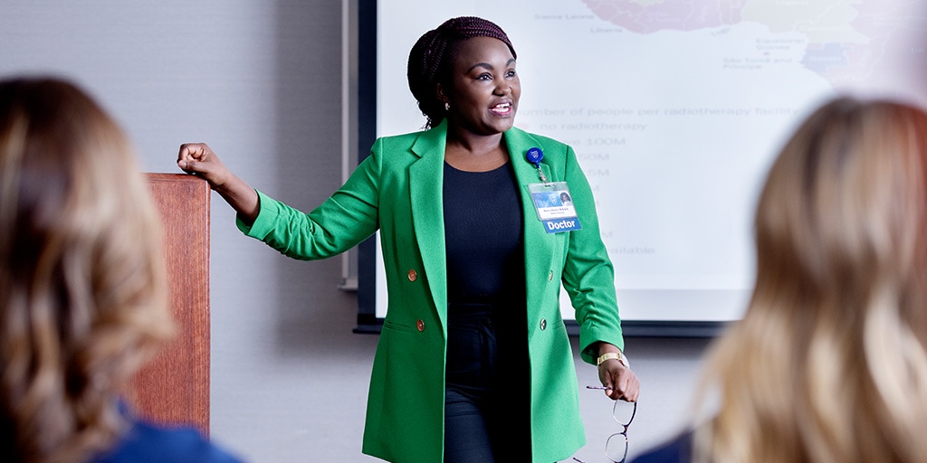 A Mayo Clinic faculty member lecturing in a classroom