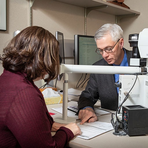 Hematopathology fellow works with a faculty member at Mayo Clinic in Rochester, Minnesota.