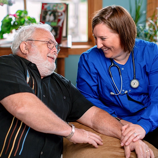 Hospice and Palliative Medicine fellow speaking with a patient at Mayo Clinic in Phoenix, Arizona.