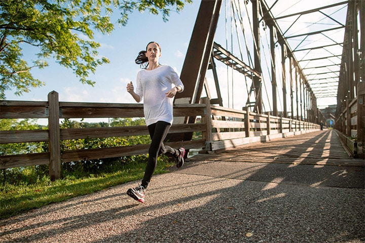 A woman runs on a bridge in Eau Claire, Wisconsin.