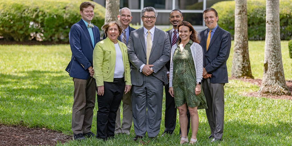 Infectious Diseases Fellowship program in Jacksonville, Florida, group photo of seven faculty members.