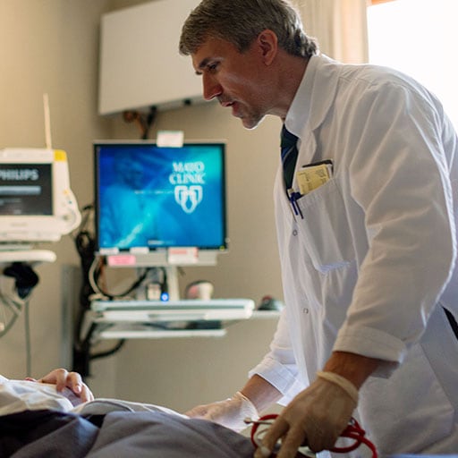 Mayo Clinic physician examines a patient post-transplant