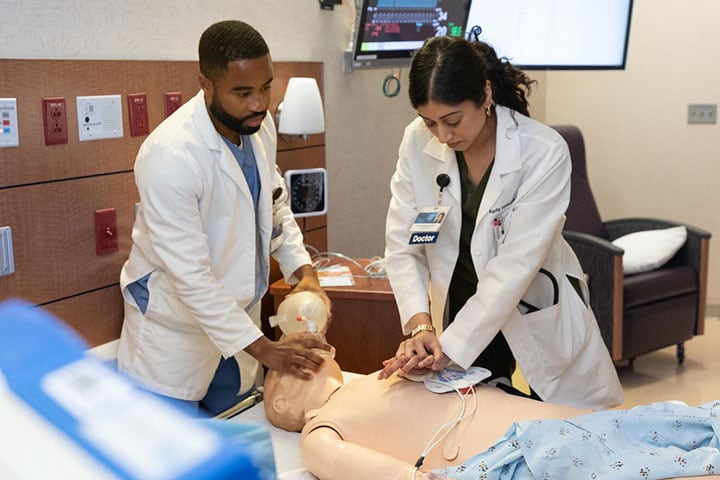 Internal medicine residents at Mayo Clinic in Florida take care of a patient in a simulation