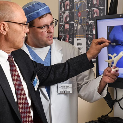 Fellowship program director examining a pulmonary scan