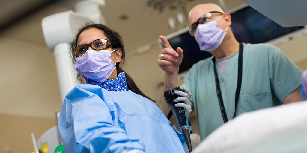 Two doctors from the Interventional Gastrointestinal Endoscopy Fellowship program in Arizona perform a procedure.