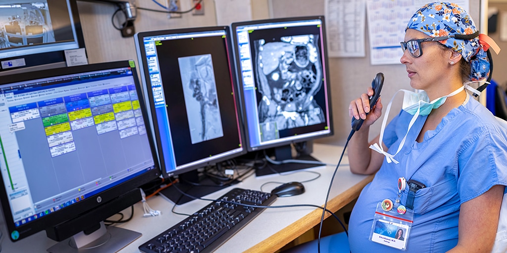 Interventional radiology resident looking at a scan at Mayo Clinic in Rochester, Minnesota.