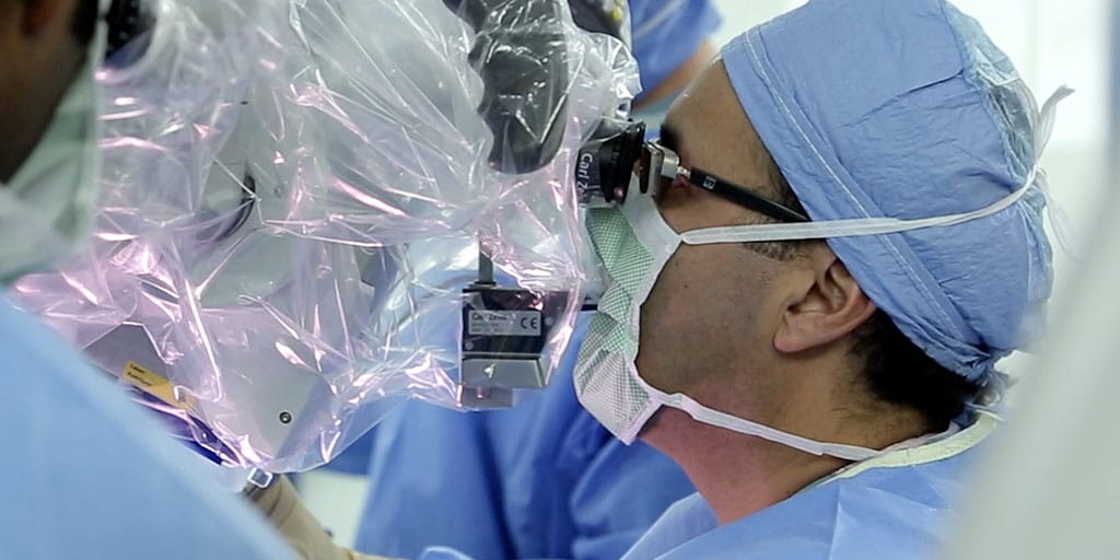 Mayo Clinic neurologic surgery faculty Dr. Quinones-Hinojosa in the operating room