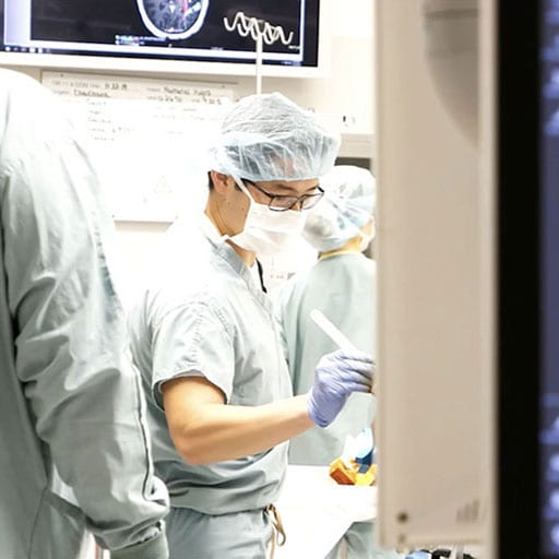 Mayo Clinic neurologic surgery faculty Dr. Chaichana in the operating room