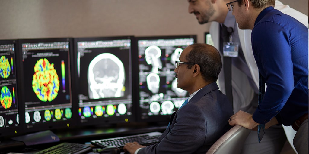 Neuroradiology fellows consult on a case