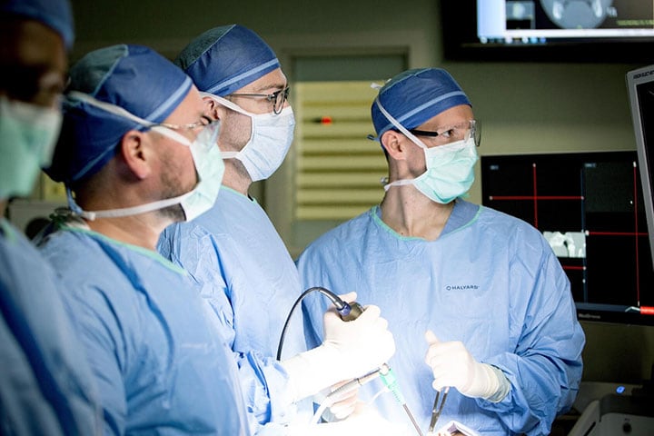 Neurosurgery faculty in the operating room