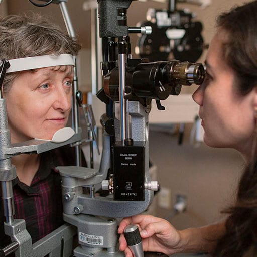 A Mayo Clinic ophthalmologist examining a patient.